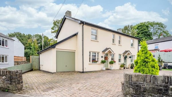 £325,000