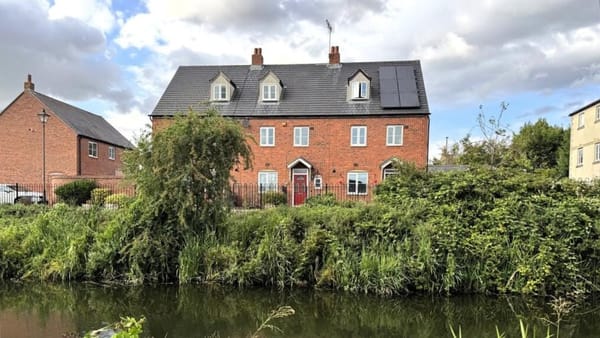 £350,000