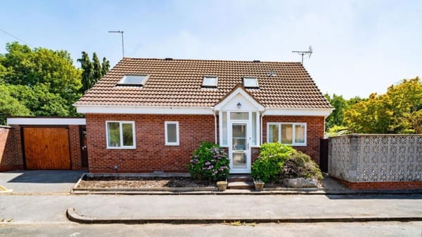 £350,000